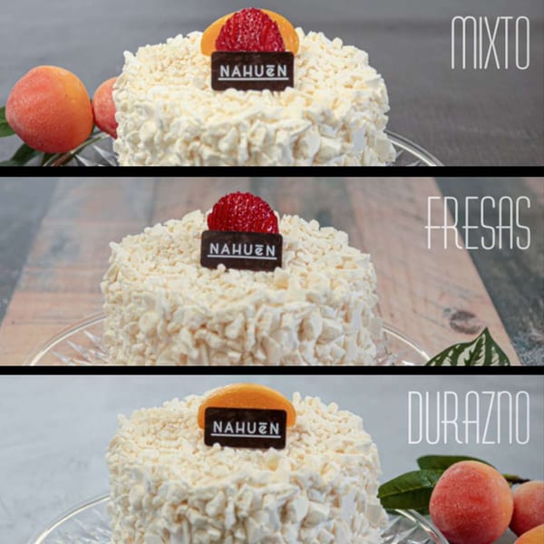 Three Nahuen cakes with white meringue, topped with mixed fruit, strawberries, and peaches.