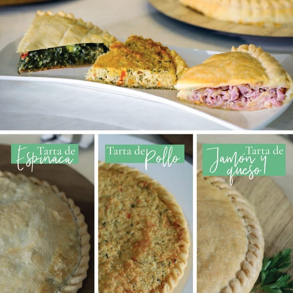Slices of Argentinian spinach tart, chicken tart, and ham and cheese empanada on a white plate.