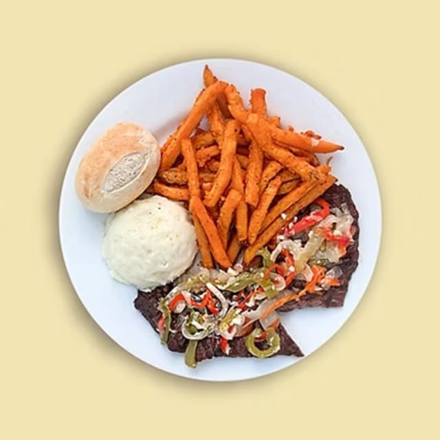 Oven-Baked Flank meat with Peppers and Onions.