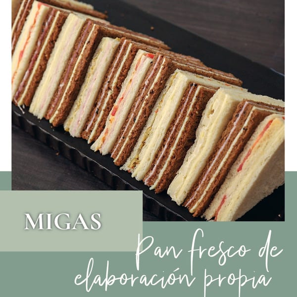 Rows of Argentinian migas sandwiches with various fillings, including ham, cheese, and vegetables.